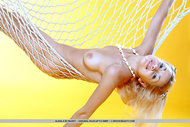 Busty Blonde Girl in Hammock - pics 01