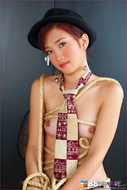 Asian Babe Covered with Ropes - pics 00