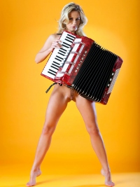 Naked Babe Plays the Accordion