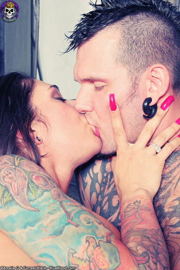 Tattooed couple fuck by the fire - picture 14
