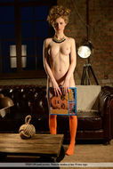 Nika Poses in Orange Stockings - pics 00