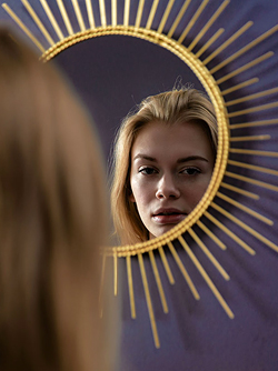 Shaved Blonde with Small Tits Elisa in Red Lingerie by the Window